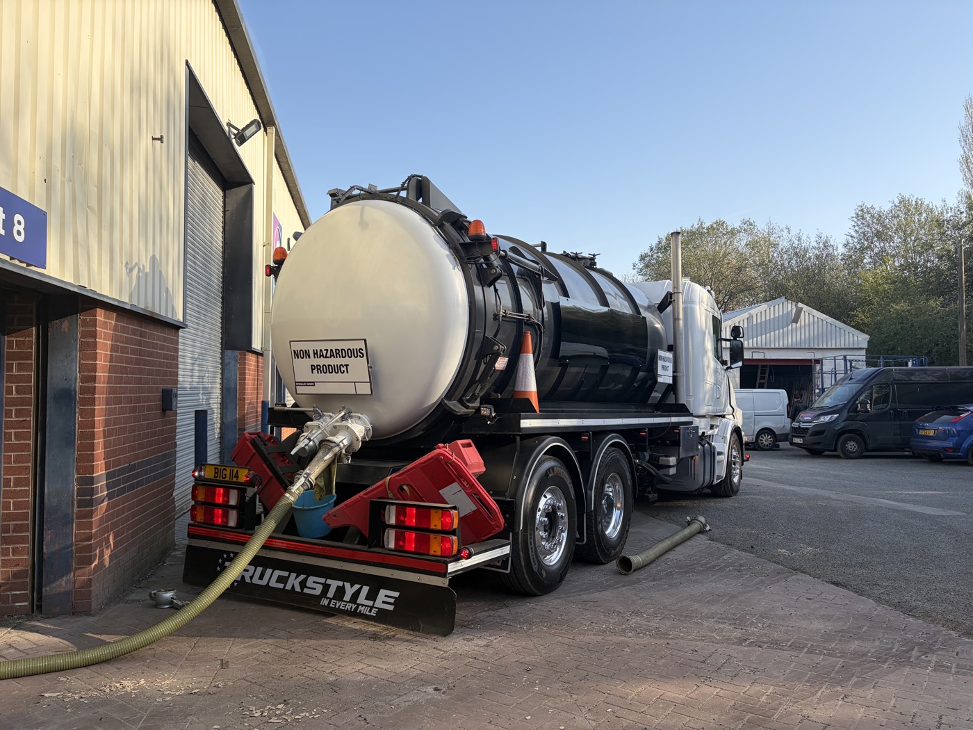 Tanker hose connected and running during a commercial tankering job